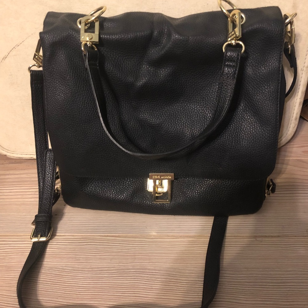 Steve Madden expandable purse with long and short straps.